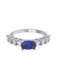 Churumbela de Oro Blanco 10k Fonelli con Zirconias redondas de 2.5 mm y una central oval azul de 6 x 4 mm 10-ZA9190B