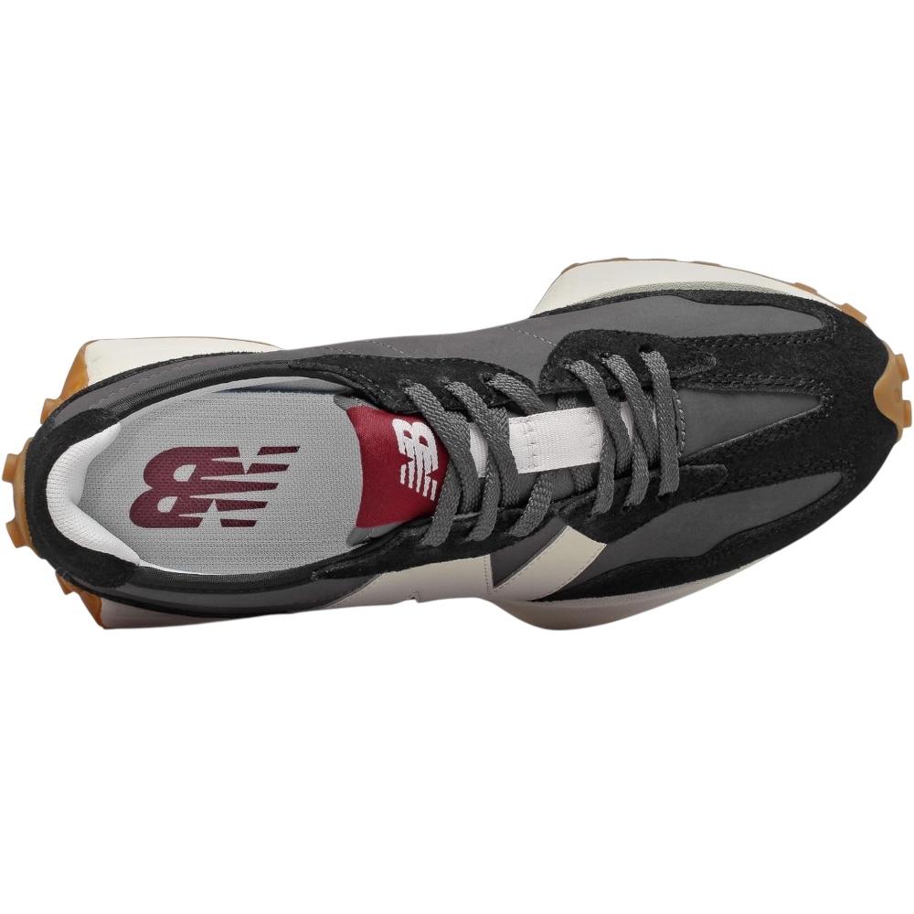 Tenis New Balance color negros con logo blanco